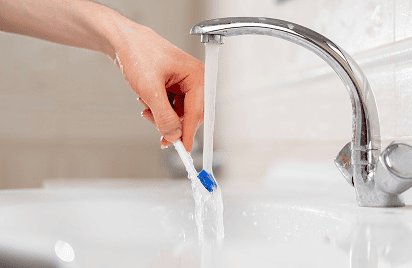 Water with your brush works about as well as conventional toothpaste